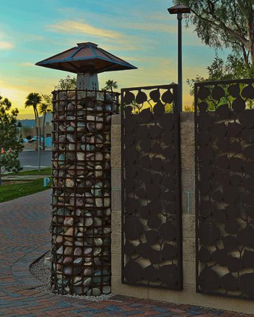 an example of work we did in Fountain Hills turning a wall hiding water feature equipment into a work of art